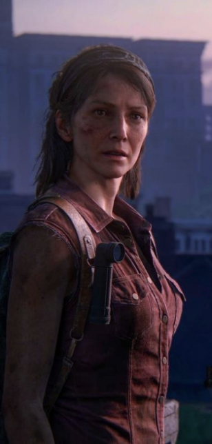 Screenshot from The Last of Us: a young woman with a headband and a sleeveless shirt stands on a rooftop at dusk, city buildings behind her.